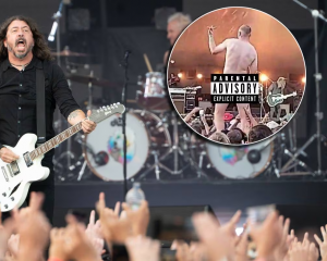 As the Foo Fighters performed in Christchurch, a man stripped fully nude.