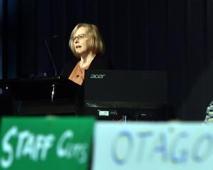 Helen Nicholson speaks at the Otago University stop work meeting at the Union Hall in September....