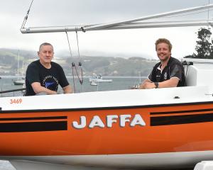 Port Chalmers Yacht Club Commodore Steve Duder and committee member Will Bennett prepare for the...