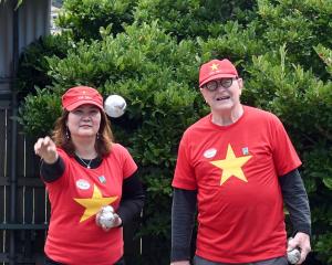 Trinh On and John Cuttance compete in the petanque at the Masters Games on Friday. PHOTO: LINDA...