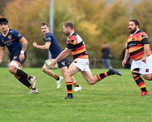 Zingari's Shaun Driver inflicting damage on the Dunedin Sharks at Montecillo last Saturday. PHOTO...