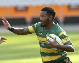 Green Island wing Vilimone Bainibure looks to fend Alhambra Union flanker Tyron Pelasio during...