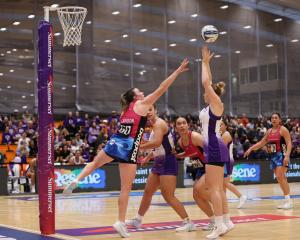 Steel defender Abby Lawson pressures Stars shooter Monica Falkner during the ANZ Premiership game...