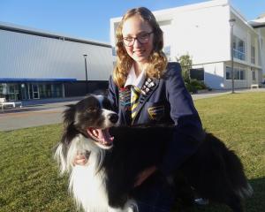 Jess Wilkinson, 15, and her competitive agility dog Zoom, 4. PHOTO: OLIVIA JUDD