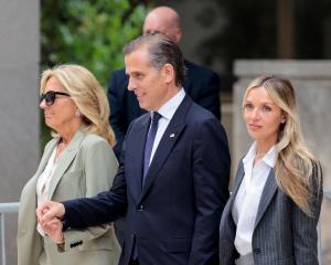 Hunter Biden, with mother and US first lady Jill Biden (left) and wife Melissa Cohen Biden. Photo...