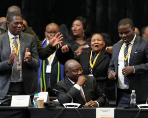 South African president Cyril Ramaphosa reacts after being re-elected. PHOTO: REUTERS