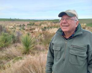 Waimate farmer Martyn Jensen inspects a planting to improve water quality on his family’s...