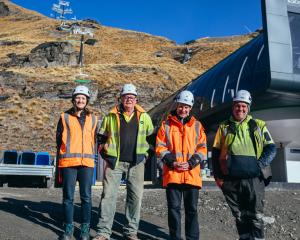In front of The Remarkables’ new Shadow Basin chair are (from left) NZSki project manager Louise...