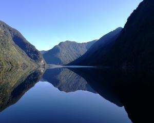  Low-lying fog comes into view as we journey into the depths of Doubtful Sound. PHOTO: ALEXIA...