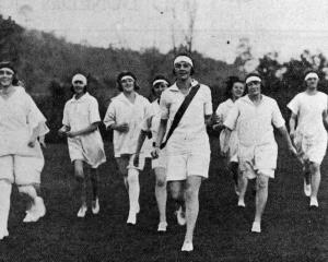 Anglican Ladies' harrier Club of Dunedin in pursuit through Woodhaugh Gardens. — Otago Witness,...