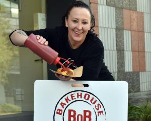 Bakehouse on Bond George St and Frederick St store manager Tenniell Anderton sauces up one of the...