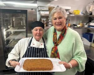 Margaret Hogan and Thea Artz made a special fruitcake to mark the King's birthday. Photo: Supplied