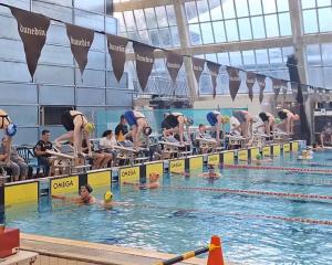 Competitors line up to hit the water, at Neptune Swim Club's Kings Birthday Meet at Moana Pool....