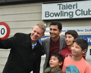 Labour Party leader Chris Hipkins takes a selfie in Mosgiel with Dr Xaviour Walker and his...