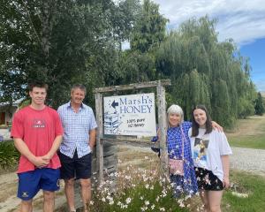 The third and fourth generation to grow up in the Marshes’ honey business are (from (left)...