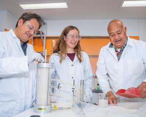 Associate Professor Ricardo Bello-Mendoza (left), UC master’s student Tamara Stratton and UC lab...
