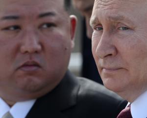 Vladimir Putin and North Korean leader Kim Jong-un during a meeting between the pair in Russia in...