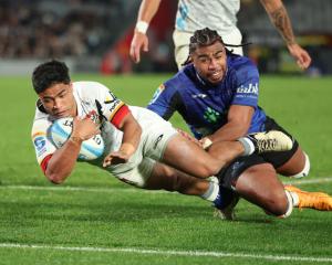 Josh Ioane of the Chiefs scores a try during the final round of Super Rugby Pacific. PHOTO: GETTY...
