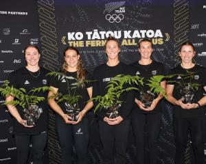 Celebrating their selection for the Paris Olympics at an announcement at Karapiro yesterday are ...