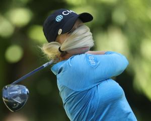 Stephanie Meadow, of Northern Ireland, hits a tee shot on the seventh hole during the first round...