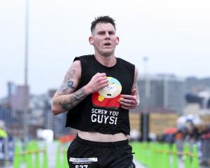 Dunedin runner Simon Cromarty on his way to winning the Wellington Marathon on Sunday. PHOTO:...