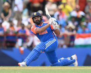 India's Rohit Sharma hits a six against Australia. Photo: Getty