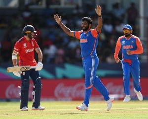 India's Jasprit Bumrah celebrates a wicket during his side's demolition of England in the second...