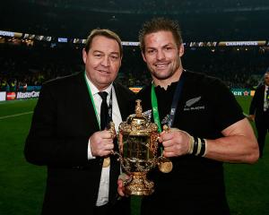 Steve Hansen (left) and Richie McCaw celebrate after defending the Rugby World Cup in 2015 at...