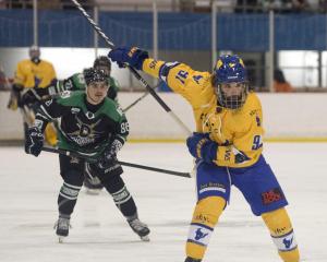 The Stampede's Colin McIntosh winds up for a ferocious shot at goal that ended up shattering the...