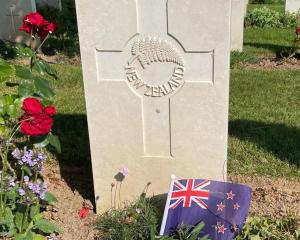 The grave of Flight Sergeant James Miller, in Bayeaux War Cemetery, France. PHOTO: JEFF BOOTH