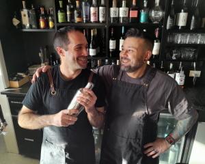 Nominated for outstanding bartender is Agustin Vijande (left) with  Cucina co-owner Pablo...