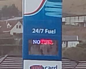 The station sign displays "no fuel".