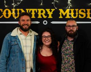 Capital of Country Music co-directors Wade McClelland, left, Jenny Mitchell and Bradon McCaughey....