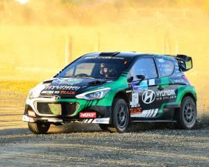 Leading New Zealand driver Hayden Paddon and co-driver Jared Hudson guide their Hyundai i20 AP4...