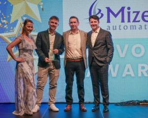 Picking up their Global Voyager award in Prague earlier this month are Mizen Automation senior...
