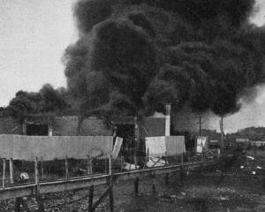 Fire at British Imperial Oil Co store in Invercargill, pictured 22 hours after the fire started,...