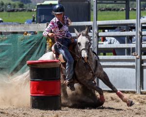 Dunstan High School pupil Sky Sanders and Lynx show their barrel racing skills. PHOTO: MIKE CHAPPELL