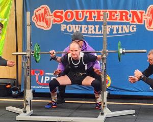 Lucas Hall, of Dunedin, completes his squat during the Special Olympics Southland power lifting...