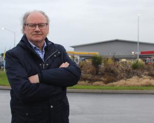 Invercargill deputy mayor Tom Campbell standing in front of the North Rd roundabout, which drew...