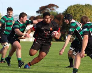 Old Boys player Sione Tukala breaks through Maheno’s defence line. PHOTO: YAMMIE MCKENZIE...