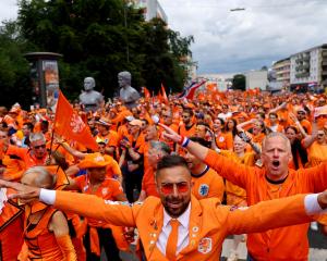 Dutch fans gather for the Euro 2024 round of 16 match between Romania and the Netherlands in...