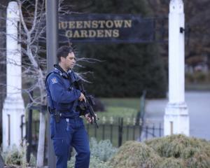 Armed police could be seen outside the garden entrance. Photo: Rhyva van Onselen 