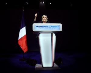Marine Le Pen speaks after the first round of French election results were announced. Photo:...
