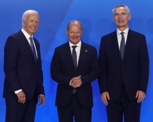 US President Joe Biden (left), German Chancellor Olaf Scholz  and NATO Secretary General Jens...