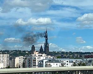 The spire of the gothic cathedral in Rouen caught fire during renovation works. Photo: Reuters