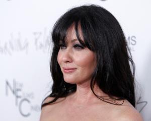 Shannen Doherty poses at the premiere of the film "Burning Palms" in Hollywood in January 2011....