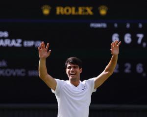 Carlos&nbsp;Alcaraz&nbsp;celebrates his victory over Novak Djokovic at Wimbledon. Photo: Reuters