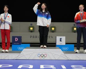 Silver medallist Yuting Huang of China, gold medallist Hyojin Ban of South Korea and bronze...