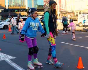 Gabrielle Wall and her daughter Alfie Smith during the car park roller disco at Riverside Market....