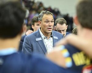 Otago Nuggets coach Brent Matehaere talks to his players during a National Basketball League game...